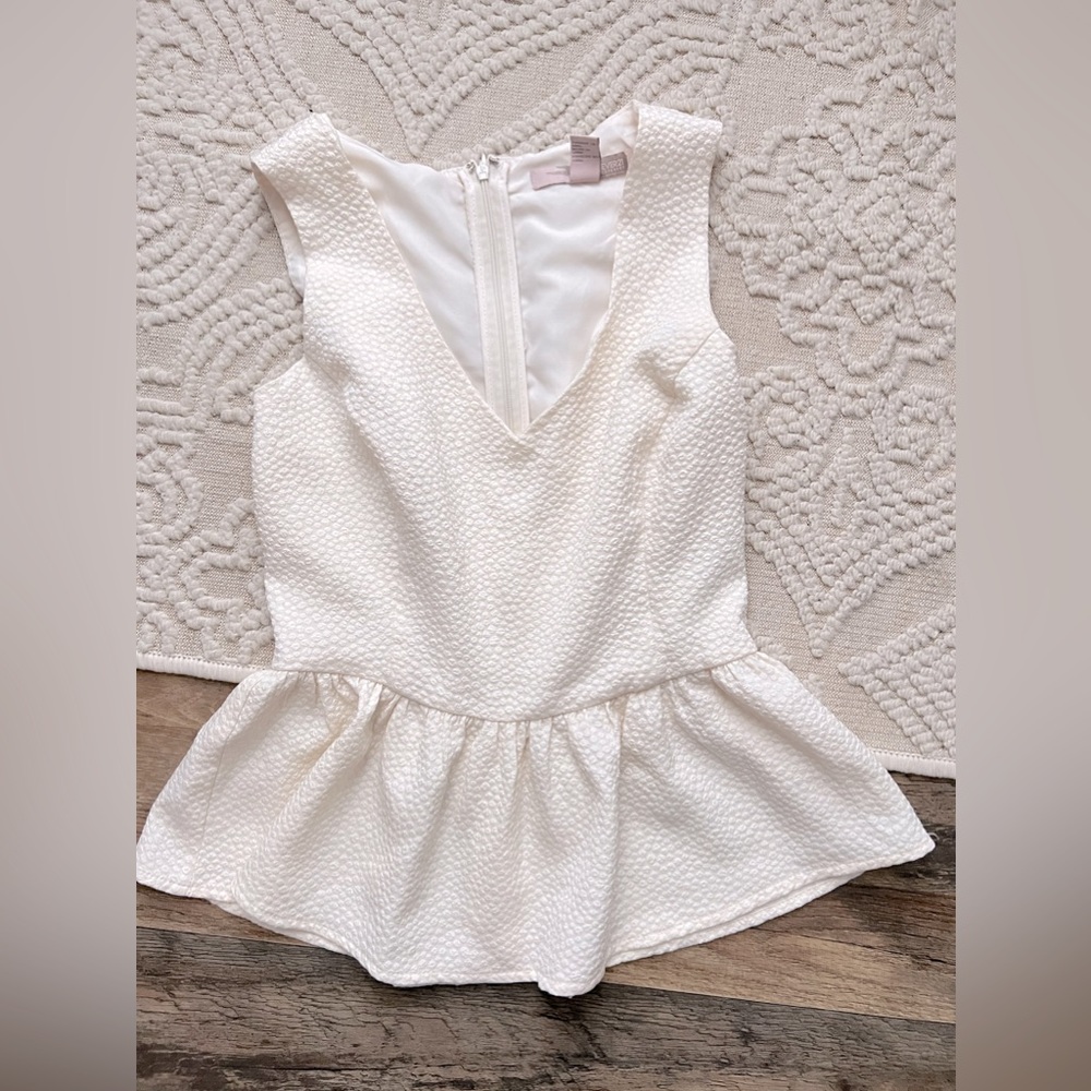 White peplum top.